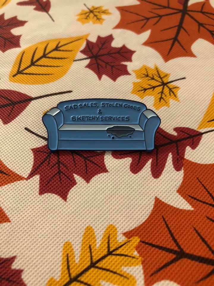 A customer's display of the couch pin with an autumn leaves linen backdrop.