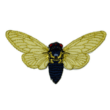 An embroidered patch of the periodical cicada with wings outstretched, featuring dark blue, red, and metallic gold details, and glow-in-the-dark wings.