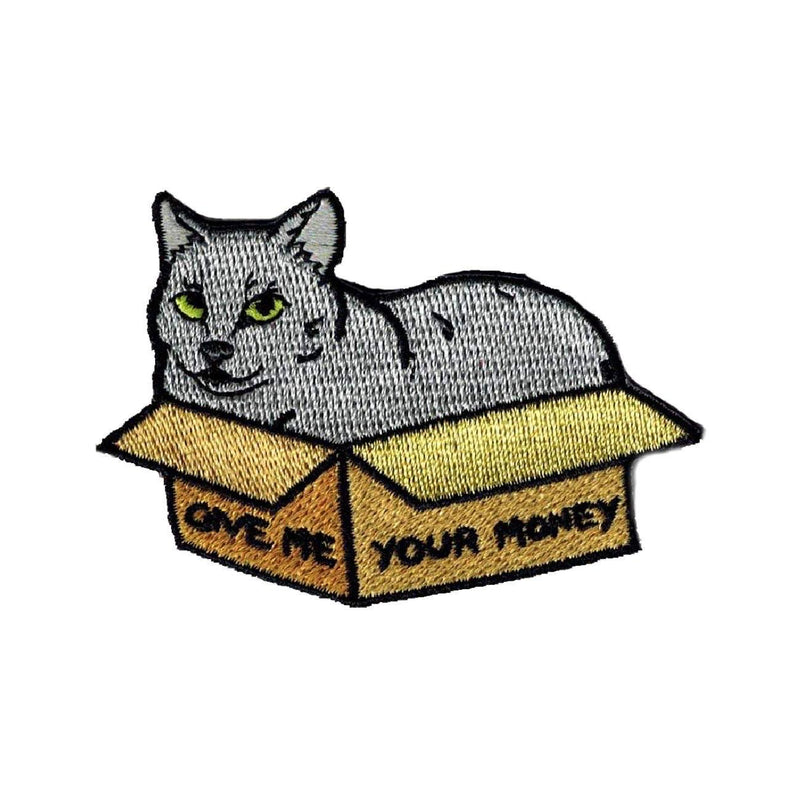 An embroidred patch of a grey cat in a cardboard box, which reads "GIVE ME YOUR MONEY".