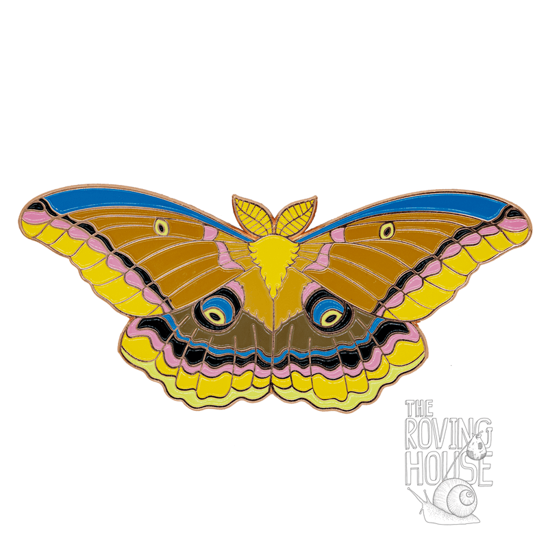 A life sized enamel pin of the colorful polyphemus moth.