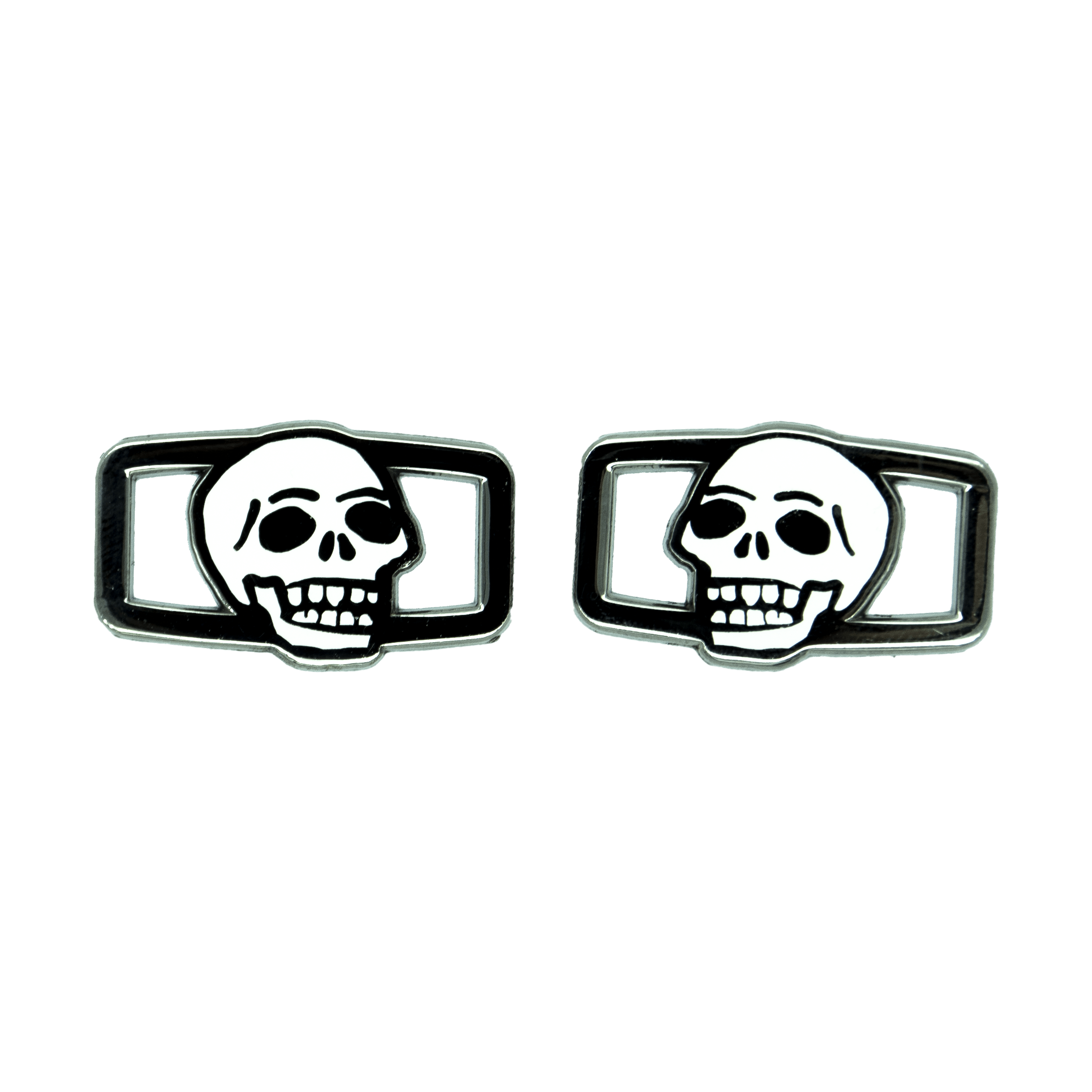 A paid of black nickel and white enamel mirrored skull shoelace charms,
